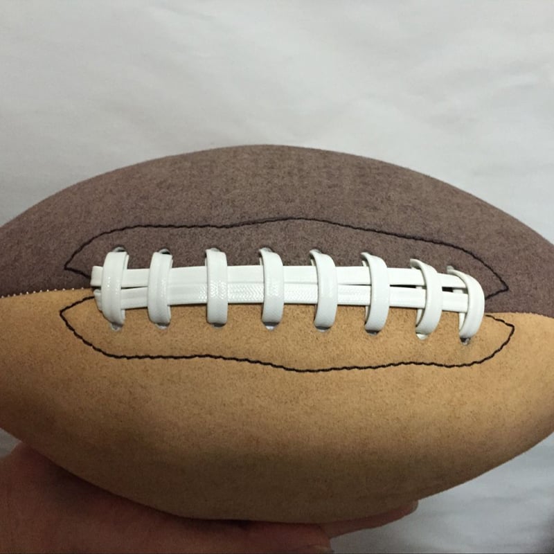 Machine stitched American football